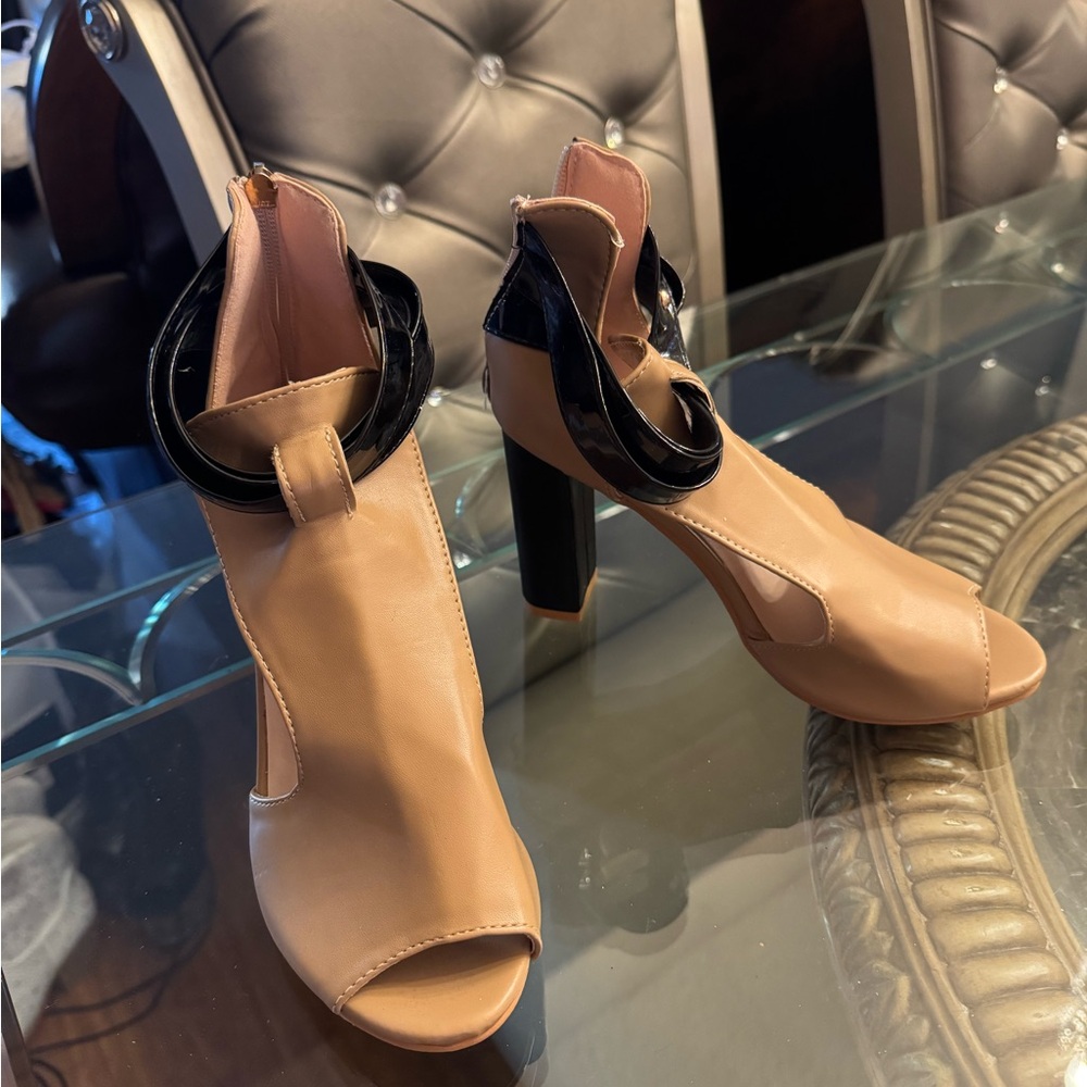 Beige open toe sandal used it once.